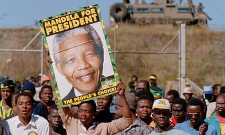 Crowds in Soweto march in support of Nelson Mandela and the ANC in the run-up to the first democratic elections in April 1994