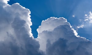 sunlit clouds in a blue sky