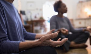 People meditating