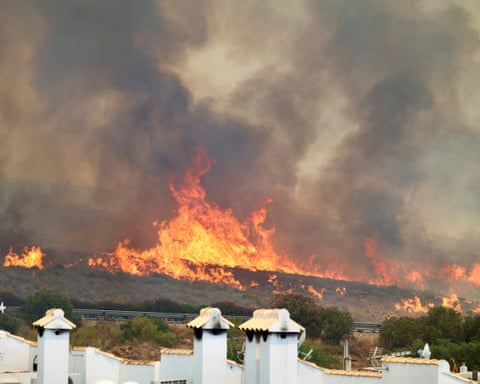 Flames on a hill road