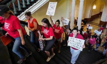 Protesters call for gun reform as they demonstrate at the Texas capitol in Austin on 8 May.
