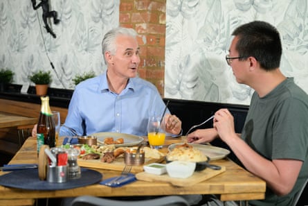 Phill smiling as he talks to Joe