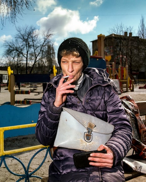 Woman Smoking on a Bench in Myrnohrad, Eastern Ukraine.