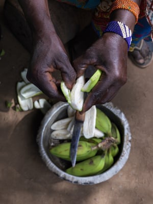 Close-up of a woman preparing bananas