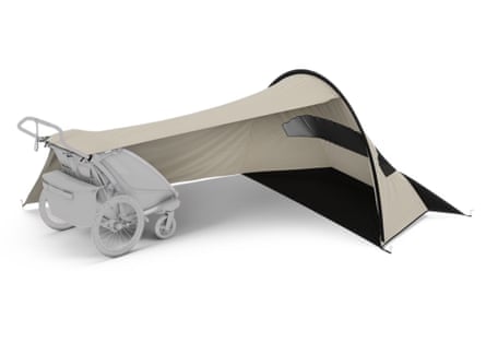 A cream-coloured tent shade that pulls out to attach to a buggy