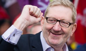 Unite's Len McCluskey with a smile and a raised fist