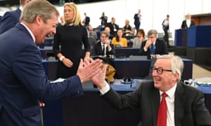 Nigel Farage (left), the former leader of the UK Independence party (Ukip) jokes with the president of the European commission, Jean-Claude Juncker.