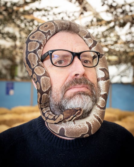 Snake charmer … Dowling and Fred the python at Hounslow Urban Farm.