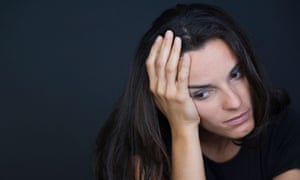 A troubled-looking young woman considers her predicament.