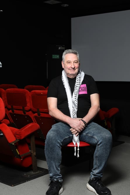 A man sitting in a cinema