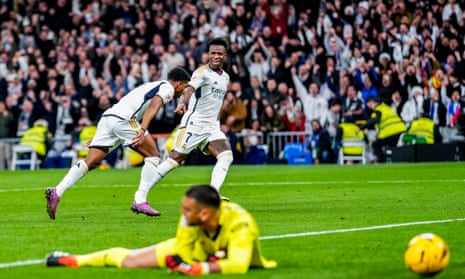 Real Madrid's Rodrygo (left), wheels away in celebration after scoring their fourth goal.