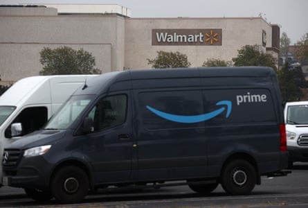 An Amazon Prime delivery van sits parked near a Walmart store on September 03, 2020 in Richmond, California.