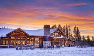 Bathed in a rich, orange and blue sunset, the adventure centre at Tahoe Donner, California.
