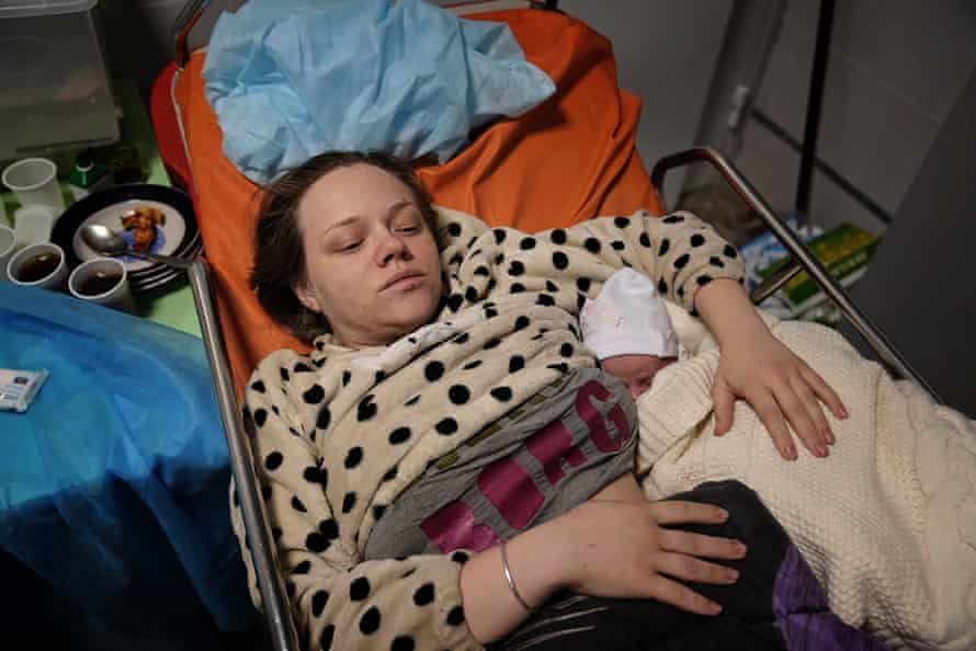 Mariana Vishegirskaya lies in a hospital bed after giving birth to her daughter Veronika in Mariupol on 11 March. Vishegirskaya survived the Russian airstrike the maternity hospital.