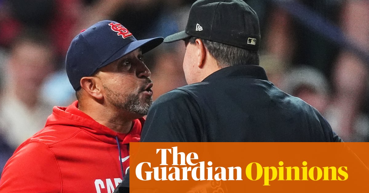 MLB umpire Doug Eddings bravely defends America from the existential threat of a slightly crooked hat.