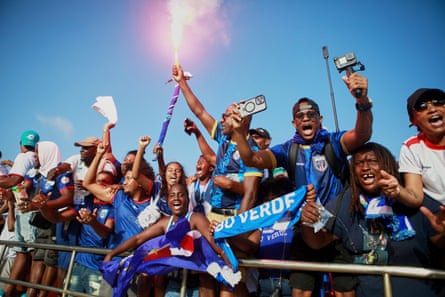 Fans celebrate in the stands at Estádio Nacional in Praia, Cape Verde.