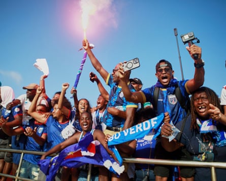 Fans celebrate in the stands after Cape Verde defeated Eswatini in a World Cup qualifying soccer match at Estádio Nacional in Praia, Cape Verde.