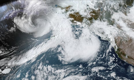A satellite image of the typhoon swirling above Alaska.