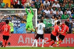 South Korea’s goalkeeper Cho Hyun-woo plucks the ball from the air