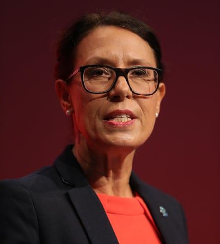 Debbie Abrahams in a red top and blue jacket