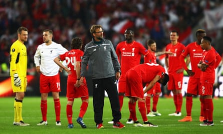 Jürgen Klopp and his Liverpool players watch on painfully as Unai Emery’s Sevilla collect the Europa League trophy in 2016.