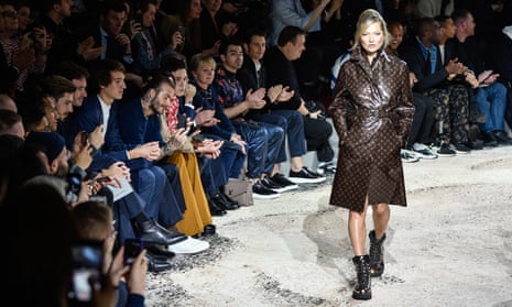 Kate Moss strides out on the catwalk for the Louis Vuitton Menswear A/W 18-19 show at Paris fashion week