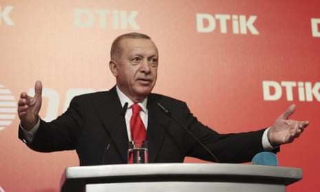 Turkey’s President Recep Tayyip Erdoğan addresses the World Turkish Business Council meeting, in Baku, Azerbaijan, Monday. Oct. 14, 2019. Erdogan says Turkey’s military offensive into northeast Syria is as “vital” to Turkey as its 1974 military intervention in Cyprus, which split the island in two. (Presidential Press Service via AP, Pool)