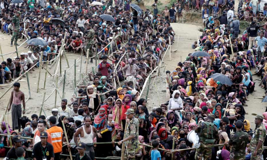 Rohingya refugees queue for aid at Cox's Bazar in Bangladesh in September 2017. The Myanmar’s military-led government’s campaign against the  ethnic minority began in the country’s western Rakhine state in 2017.