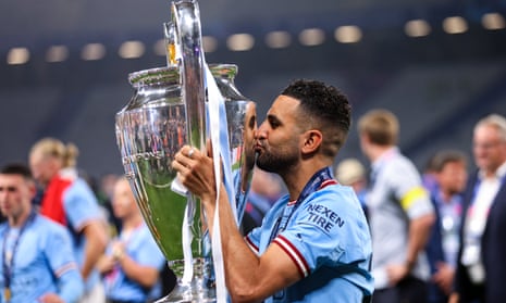 Riyad Mahrez kisses the trophy after Manchester City’s win in last month’s Champions League final.