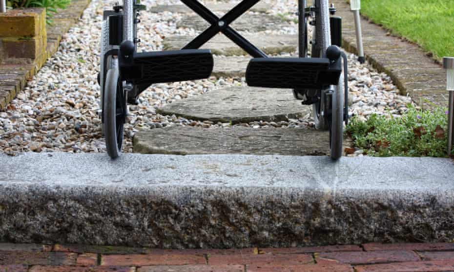 part of a wheelchair above a step