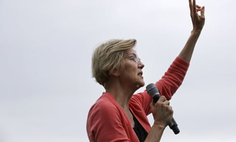 Elizabeth Warren told Democratic candidates’ town hall that industry not individuals must bear responsibility for changing energy consumption.
