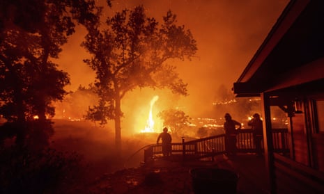 Firefighters encounter a wildfire, the fifth largest in California history, in Napa county California on 21 August 2020.