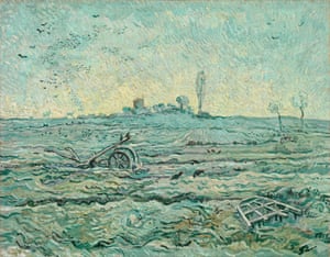 Snow-covered field with a harrow