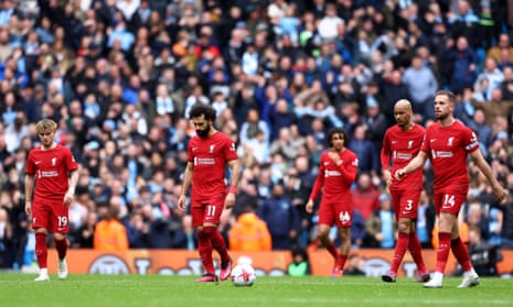 Liverpool’s Fabinho (second right), Harvey Elliott (left), Mohamed Salah (centre) and Jordan Henderson react after Manchester City’s Ilkay Gundogan scores their third goal.