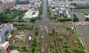 WEIHUI, CHINA - JULY 26: Aerial view of rescue team using inflatable rafts evacuate residents from flooded area after heavy downpour, on July 26, 2021 in Weihui, Xinjiang City, Henan Province of China.