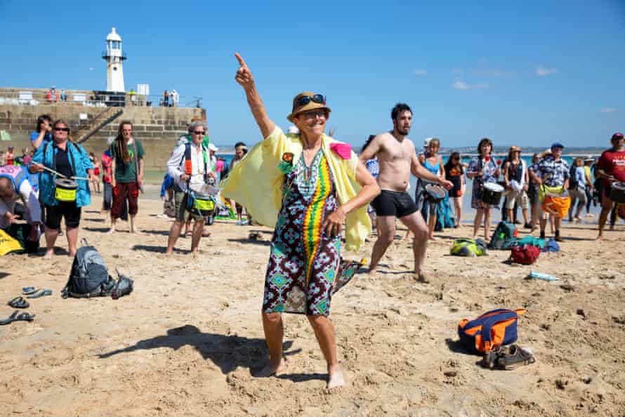 Extinction Rebellion protesters at a 'discobedience' event on the beach in St Ives