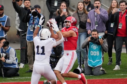 Jasmine catches a touchdown pass over Penn State Nittany Lions quarterback Abdul Carter