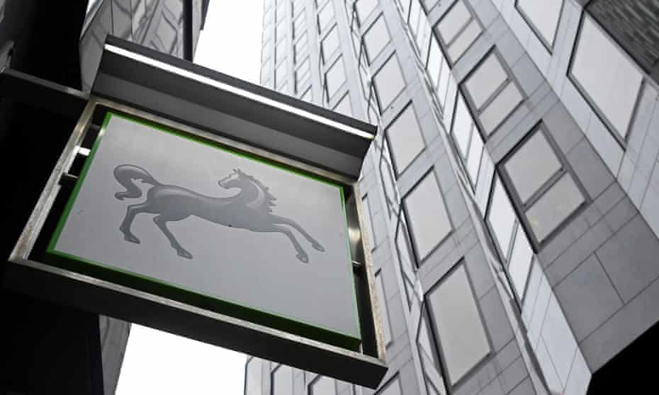 A sign hangs outside a Lloyds Bank branch in London