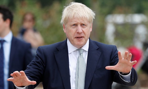 Boris Johnson arrives for a walkabout at a garden centre in Surrey