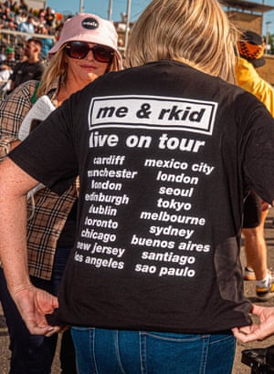 The back of a fan’s T-shirt, which says ‘me & rkid live on tour’