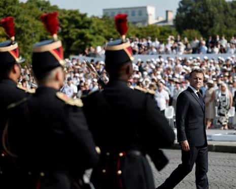 French president Emmanuel Macron reviews the troops on the Place de la Concorde during the annual Bastille Day military parade in Paris, France.