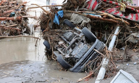 A car left wrecked after heavy rains cause floods in Kastamonu.