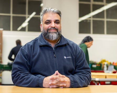 Sajid Mohammed sitting at a table