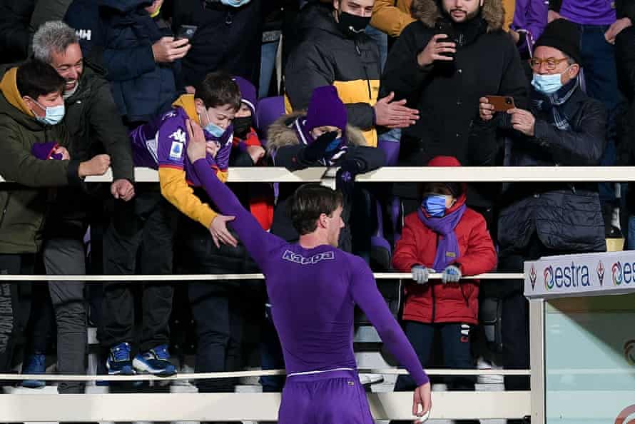 Dusan Vlahovic gives his shirt to a young Fiorentina fan