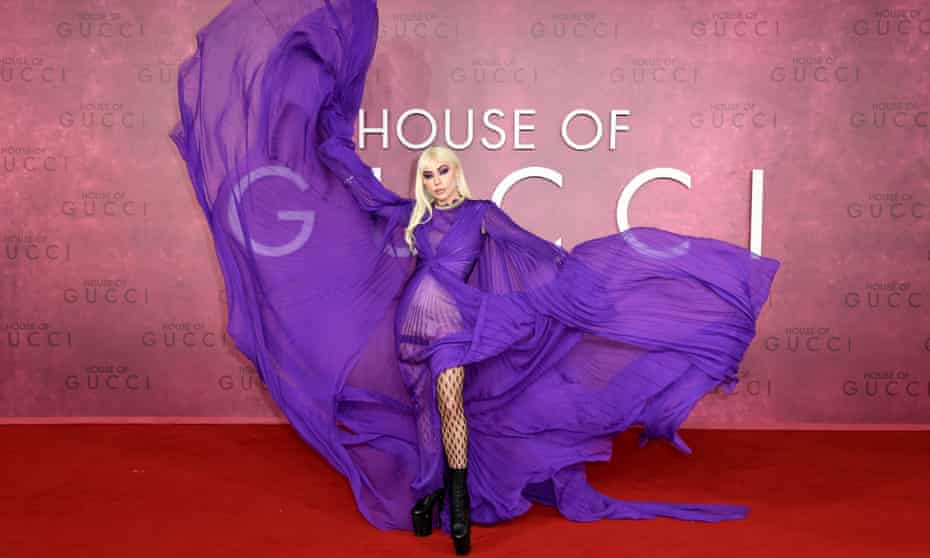 Lady Gaga attends the UK Premiere Of House of Gucci in London wearing a flowing Gucci gown.