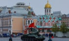 Putin watches Russian military parade featuring a solitary, Soviet-era tank