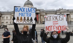 Protesters in London’s Trafalgar Square earlier today.