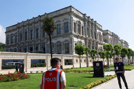 Police officers stand guard ahead of the second round of peace talks between Russia and Ukraine at Ciragan Palace in Istanbul.