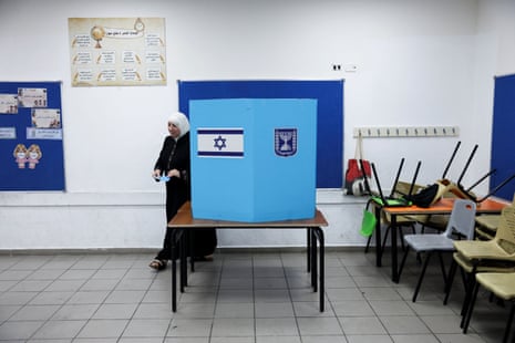 A woman votes in the city of Umm al-Fahm.