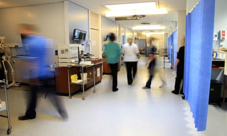 Staff moving around a hospital ward